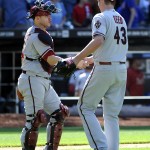 Arizona Diamondbacks catcher Miguel Montero, left, congratulates relief pitcher Addison Reed, right, after the Diamondbacks beat the New York Mets 2-1 in game one of a double header baseball game at Citi Field on Sunday, May 25, 2014, in New York. (AP Photo/Kathy Kmonicek)