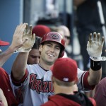 Arizona Diamondbacks' Paul Goldschmidt, center, is greeted by teammates after he scored on a double hit by Miguel Montero during the third inning of a baseball game against the Los Angeles Dodgers, Saturday, April 19, 2014, in Los Angeles. (AP Photo/Jae C. Hong)