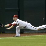 Arizona Diamondbacks right fielder Ender Inciarte makes the diving catch on a ball hit by Atlanta Braves Jace Peterson in the second inning during a baseball game, Tuesday, June 2, 2015, in Phoenix. (AP Photo/Rick Scuteri)