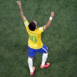 Brazil's Neymar celebrates his goal against Croatia during the group A World Cup soccer match between Brazil and Croatia, the opening game of the , Brazil, Thursday, June 12, 2014. (AP Photo/Fabrizio Bensch, Pool)