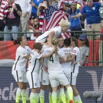 The United States team celebrates a goal against Colombia during second half FIFA Women's World Cup round of 16 soccer action in Edmonton, Alberta, Canada, Monday, June 22, 2015. (Jason Franson/The Canadian Press via AP) 