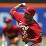 Arizona Diamondbacks starting pitcher Rubby De La Rosa delivers in the first inning of a baseball game against the New York Mets in New York, Sunday, July 12, 2015. (AP Photo/Kathy Willens)
