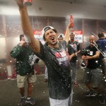 St. Louis Cardinals outfielder Jon Jay celebrates in the clubhouse after a game between the St. Louis Cardinals and the Arizona Diamondbacks on Sunday, Sept. 28, 2014, at Chase Field in Phoenix, Ariz. The Cardinals clinched the National League Central Division championship and will face the Los Angeles Dodgers in the NLCS. (AP Photo/St. Louis Post-Dispatch, Chris Lee)