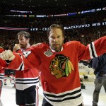 Chicago Blackhawks' Niklas Hjalmarsson, of Sweden, celebrates after defeating the Tampa Bay Lightning in Game 6 of the NHL hockey Stanley Cup Final series on Monday, June 15, 2015, in Chicago. The Blackhawks defeated the Lightning 2-0 to win the series 4-2. (AP Photo/Nam Y. Huh)
