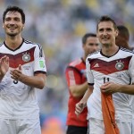 Germany's Mats Hummels, left, and Miroslav Klose celebrate at the end of the World Cup quarterfinal soccer match between Germany and France at the Maracana Stadium in Rio de Janeiro, Brazil, Friday, July 4, 2014. Germany won the match 1-0. (AP Photo/Martin Meissner)