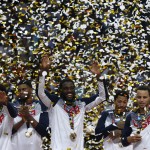 United States players celebrate their victory after wining the final World Basketball match against Serbia at the Palacio de los Deportes stadium in Madrid, Spain, Sunday, Sept. 14, 2014. (AP Photo/Daniel Ochoa de Olza)