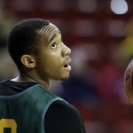 North Dakota State's Lawrence Alexander spins a ball on his finger during practice for an NCAA college basketball tournament second-round game in Seattle, Thursday, March 19, 2015. North Dakota State is to play Gonzaga on Friday. (AP Photo/Elaine Thompson)