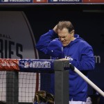 Kansas City Royals manager Ned Yost scratches his head during the sixth inning of Game 1 of baseball's World Series against the San Francisco Giants Tuesday, Oct. 21, 2014, in Kansas City, Mo. (AP Photo/Matt Slocum)