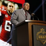 Former Atlanta Falcons center Todd McClure announces that the Falcons selects LSU defensive back Jalen Collins as the 42nd pick in the second round of the 2015 NFL Football Draft, Friday, May 1, 2015, in Chicago. (AP Photo/Charles Rex Arbogast)