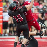 Eastern Washington defensive lineman Marcus Saugen (93) takes Montana Western quarterback Tyler Hulse (15) to the turf after Hulse released a pass during the first half of an NCAA college football game, Saturday, Aug. 30, 2014, in Cheney, Wash. (AP Photo/The Spokesman-Review, Colin Mulvany)
