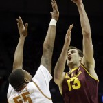  Arizona State center Jordan Bachynski (13) takes a shot over Texas center Cameron Ridley (55) during the first half of a second round NCAA college basketball tournament game Thursday, March 20, 2014, in Milwaukee. (AP Photo/Morry Gash)