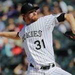 Colorado Rockies starting pitcher Eddie Butler throws to the plate against the Arizona Diamondbacks during the first inning of a baseball game Saturday, Sept. 20, 2014, in Denver. (AP Photo/Jack Dempsey)