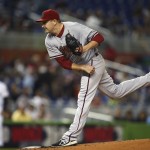  Arizona Diamondbacks starter Trevor Cahill pitches to the Miami Marlins during the first inning of a baseball game in Miami, Friday, Aug. 15, 2014. (AP Photo/J Pat Carter)
