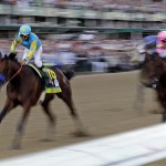 Victor Espinoza rides American Pharoah to victory in the 141st running of the Kentucky Derby horse race at Churchill Downs Saturday, May 2, 2015, in Louisville, Ky. (AP Photo/Tim Donnelly)
