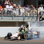 Townsend Bell crashes in the second turn during the 98th running of the Indianapolis 500 IndyCar auto race at the Indianapolis Motor Speedway in Indianapolis, Sunday, May 25, 2014. The crash brought out the red flag to stop the race on lap 192. (AP Photo/Mike Fair)