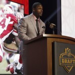 Former NFL player Adrian Wilson announces that the Arizona Cardinals selects Missouri defensive lineman Markus Golden as the 58th pick in the second round of the 2015 NFL Football Draft, Friday, May 1, 2015, in Chicago. (AP Photo/Charles Rex Arbogast)