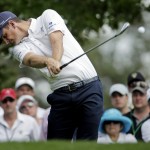  Justin Rose, of England, tees off on the fourth hole during the fourth round of the Masters golf tournament Sunday, April 13, 2014, in Augusta, Ga. (AP Photo/Charlie Riedel)