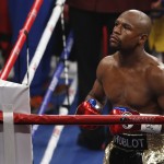 Floyd Mayweather Jr. enters the ring before his welterweight title fight against Manny Pacquiao, from the Philippines, on Saturday, May 2, 2015 in Las Vegas. (AP Photo/Eric Jamison)