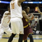  Arizona State guard Shaquielle McKissic, right, drives against Texas forward Jonathan Holmes during the first half of a second round NCAA college basketball tournament game Thursday, March 20, 2014, in Milwaukee. (AP Photo/Morry Gash)