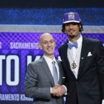 Willie Cauley-Stein, right, poses for photos with NBA Commissioner Adam Silver after being selected sixth overall by the Sacramento Kings during the NBA basketball draft, Thursday, June 25, 2015, in New York. (AP Photo/Kathy Willens)
