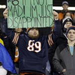 A fan holds up a sign after an NFL football game between the Chicago Bears and the New Orleans Saints Monday, Dec. 15, 2014, in Chicago. The Saints won 31-15. (AP Photo/Nam Y. Huh)