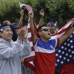 United States fans cheer while watching a broadcast of a 2014 World Cup soccer match between the United States and Germany at a public viewing party in San Francisco, Thursday, June 26, 2014. (AP Photo/Jeff Chiu)

