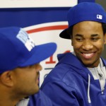 Kansas City Royals' Yordano Ventura, right, smiles as Christian Colon talks during a media availability, Monday, Oct. 20, 2014, in Kansas City, Mo. The Royals are scheduled to play Game 1 of baseball's World Series against the San Francisco Giants on Tuesday. (AP Photo/Orlin Wagner)