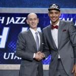Trey Lyles poses for photos with NBA Commissioner Adam Silver after being selected 12th overall by the Utah Jazz during the NBA basketball draft, Thursday, June 25, 2015, in New York. (AP Photo/Kathy Willens)

