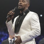 Actor Jamie Foxx sings the national anthem before the start of the world welterweight championship bout between Floyd Mayweather Jr., and Manny Pacquiao, on Saturday, May 2, 2015 in Las Vegas. (AP Photo/Isaac Brekken)