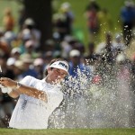  Bubba Watson hits out of a bunker on the seventh hole during the fourth round of the Masters golf tournament Sunday, April 13, 2014, in Augusta, Ga. (AP Photo/Chris Carlson)