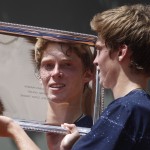 Russia's Andrey Rublev holds the trophy after winning the junior boys final match of the French Open tennis tournament against Spain's Jaume Antoni Munar Clar at the Roland Garros stadium, in Paris, France, Saturday, June 7, 2014. Rublev won in two sets 6-2, 7-5. (AP Photo/Thibault Camus)