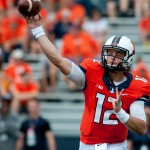 Illinois quarterback Wes Lunt (12) throws the ball during the second quarter of an NCAA college football game against Youngstown State, Saturday, Aug. 30, 2014, at Memorial Stadium in Champaign, Ill. (AP Photo/Bradley Leeb)