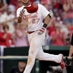 St. Louis Cardinals' Jhonny Peralta tosses his helmet as he heads for home after hitting a walk-off solo home run during the 10th inning of a baseball game against the Arizona Diamondbacks Monday, May 25, 2015, in St. Louis. The Cardinals won 3-2. (AP Photo/Jeff Roberson)