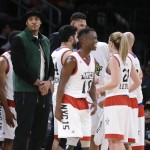 New York Knicks' Carmelo Anthony, stands with his team during the first half of the NBA All-Star celebrity basketball game Friday, Feb. 13, 2015, in New York. (AP Photo/Frank Franklin II)