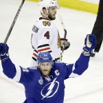 Tampa Bay Lightning center Steven Stamkos (91) reacts after teammate center Valtteri Filppula (51) scored a goal against the Chicago Blackhawks during the second period of Game 5 of the NHL hockey Stanley Cup Final, Saturday, June 13, 2015, in Tampa, Fla. (AP Photo/John Raoux)