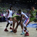 Dominican Republic's Orlando Sanchez, second right, vies for the ball against Slovenia's Edo Muric, center, during Basketball World Cup Round of 16 match between Dominican Republic and Slovenia at the Palau Sant Jordi in Barcelona, Spain, Saturday, Sept. 6, 2014. The 2014 Basketball World Cup competition will take place in various cities in Spain from Aug. 30 through to Sept. 14. (AP Photo/Manu Fernandez)