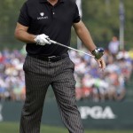 Phil Mickelson watches his tee shot on the fifth hole during the final round of the PGA Championship golf tournament at Valhalla Golf Club on Sunday, Aug. 10, 2014, in Louisville, Ky. (AP Photo/David J. Phillip)
