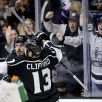  Los Angeles Kings defenseman Drew Doughty, left, celebrates his goal with left wing Kyle Clifford during the second period of Game 1 in the NHL Stanley Cup Final hockey series against the New York Rangers on Wednesday, June 4, 2014, in Los Angeles.(AP Photo/Jae C. Hong)