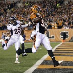 Cincinnati Bengals running back Jeremy Hill (32) celebrates after running 85 yards for a touchdown during the first half of an NFL football game against the Denver Broncos on Monday, Dec. 22, 2014, in Cincinnati. (AP Photo/AJ Mast)