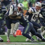 New England Patriots running back LeGarrette Blount (29) runs against the Seattle Seahawks during the first half of NFL Super Bowl XLIX football game Sunday, Feb. 1, 2015, in Glendale, Ariz. (AP Photo/Matt Slocum)