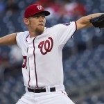 Washington Nationals starter Stephen Strasburg delivers a pitch during the first inning of a baseball game against the Arizona Diamondbacks on Tuesday, Aug. 19, 2014, in Washington. (AP Photo/Evan Vucci)