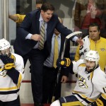 Nashville Predators head coach Peter Laviolette, top, yells during the third period in Game 6 of an NHL Western Conference hockey playoff series against the Chicago Blackhawks, Saturday, April 25, 2015, in Chicago. The Blackhawks won 4-3. (AP Photo/Nam Y. Huh)