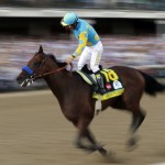 Victor Espinoza rides American Pharoah to victory in the 141st running of the Kentucky Derby horse race at Churchill Downs Saturday, May 2, 2015, in Louisville, Ky. (AP Photo/Tim Donnelly)