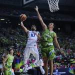 Dominican Republic James Feldeine, second right, vies for the ball over Slovenia's Jure Balazic during Basketball World Cup Round of 16 match at the Palau Sant Jordi in Barcelona, Spain, Saturday, Sept. 6, 2014. The 2014 Basketball World Cup competition will take place in various cities in Spain from Aug. 30 through to Sept. 14. (AP Photo/Manu Fernandez)