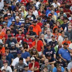 Fans watch an awards ceremony at Doubleday Field on Saturday, July 25, 2015, in Cooperstown, N.Y. (AP Photo/Mike Groll)
