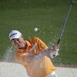 Stewart Cink hits out of a bunker on the 18th hole during the third round of the Masters golf tournament Saturday, April 12, 2014, in Augusta, Ga. (AP Photo/Matt Slocum)