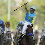 Victor Espinoza rides American Pharoah to victory in the 141st running of the Kentucky Derby horse race at Churchill Downs Saturday, May 2, 2015, in Louisville, Ky. (AP Photo/Darron Cummings)