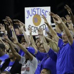 Duke fans cheer during the second half of a college basketball regional final game against Gonzaga in the NCAA Tournament Sunday, March 29, 2015, in Houston. (AP Photo/David J. Phillip)
