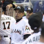 Miami Marlins left fielder Ichiro Suzuki (51) stands in the dugout before a baseball game in Miami against the Arizona Diamondbacks, Wednesday, May 20, 2015. He is not in the starting lineup. (AP Photo/J Pat Carter)
