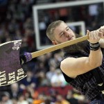 The Stephens F. Austin mascot swings his ax during the first half of an NCAA college basketball second-round game against Utah in Portland, Ore., Thursday, March 19, 2015. (AP Photo/Craig Mitchelldyer)